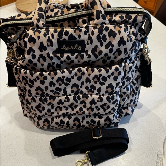 Itzy Ritzy Handbags - Itzy Ritzy Black and Tan Leopard Backpack